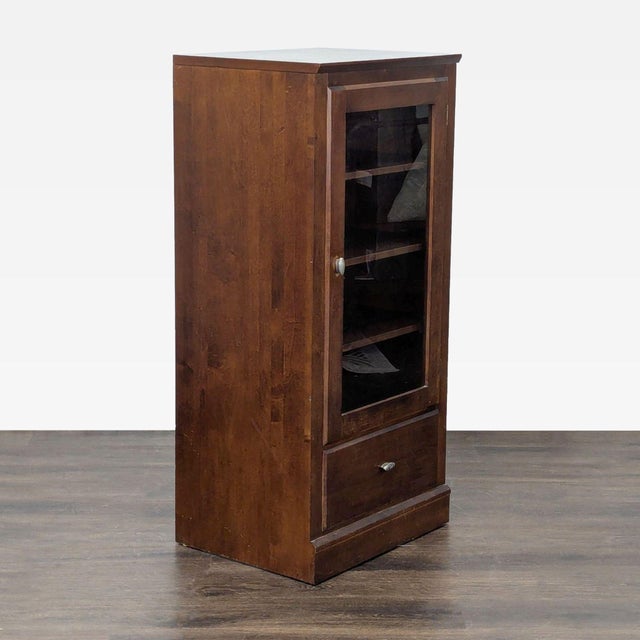 Four shelves and glass door. Brand: Ethan Allen. Original Price: $899. Dimensions (in): 24W x 19D x 51H.
