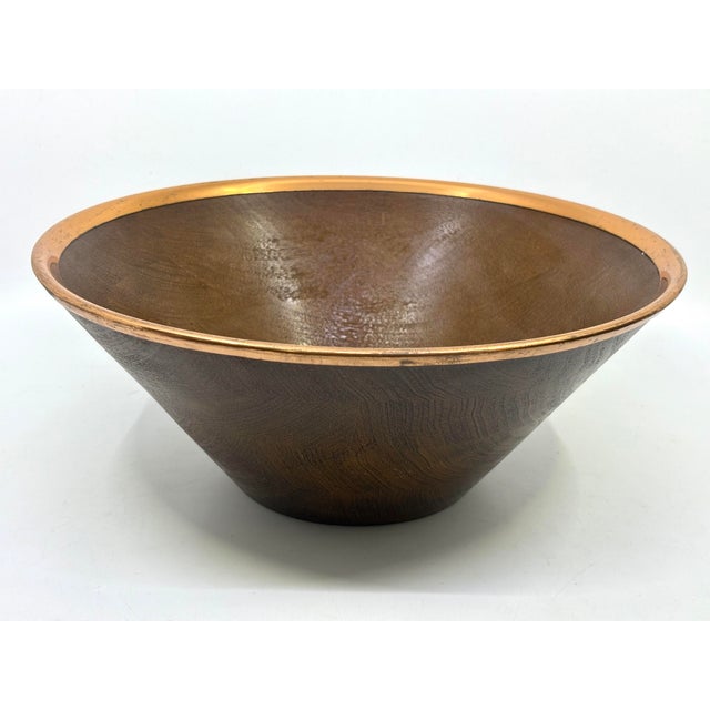 Mid century 1970's wooden bowl with copper trim. Salad bowl or serving bowl. Stickered on underside. Very nice for...