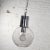 Handsome mid-century modern chrome and lightly smoked glass open globe pendant light with chrome chain. It is in wonderful...