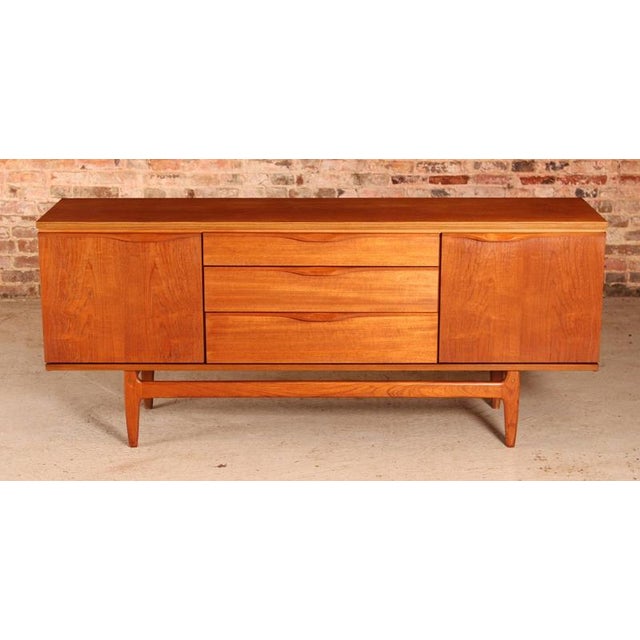 Mid Century teak sideboard by Austinsuite, circa 1960s. 2 cabinet sections and 3 drawers. Excellent restored condition. W...