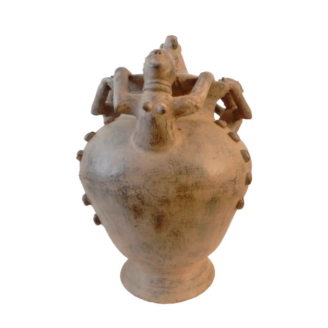 This exceptional and rare large Ashanti clay vessel/vase /water pot etc... from Ghana, standing 24.5" tall, was...