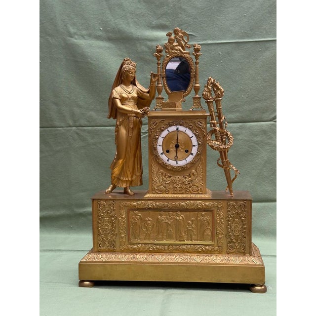 Mercury-gilt bronze mantel clock, Empire style, France, early 19th century Magnificent mercury-gilt bronze mantel clock,...