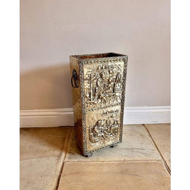 Unusual quality antique Edwardian ornate brass stick stand, having quality brass ornate detail throughout and two scenes...