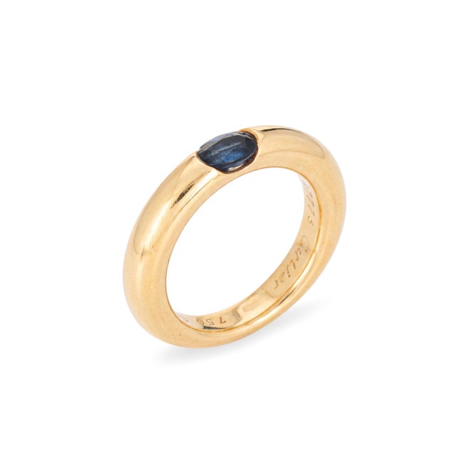 Vintage Cartier sapphire 'Ellipse' ring crafted in 18k yellow gold (circa 1992). Oval faceted sapphire measures approx....