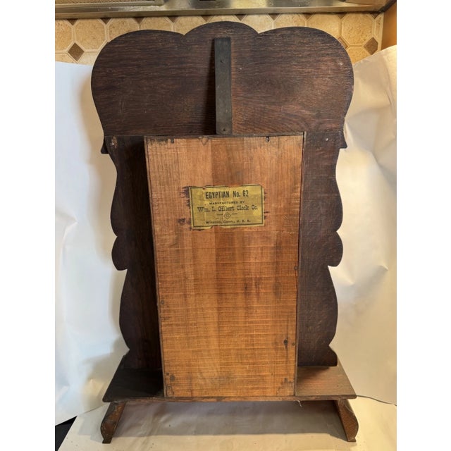 This listing is for an antique parlor mantel clock. This clock is the “Egyptian No.62” model by Gilbert and it features a...