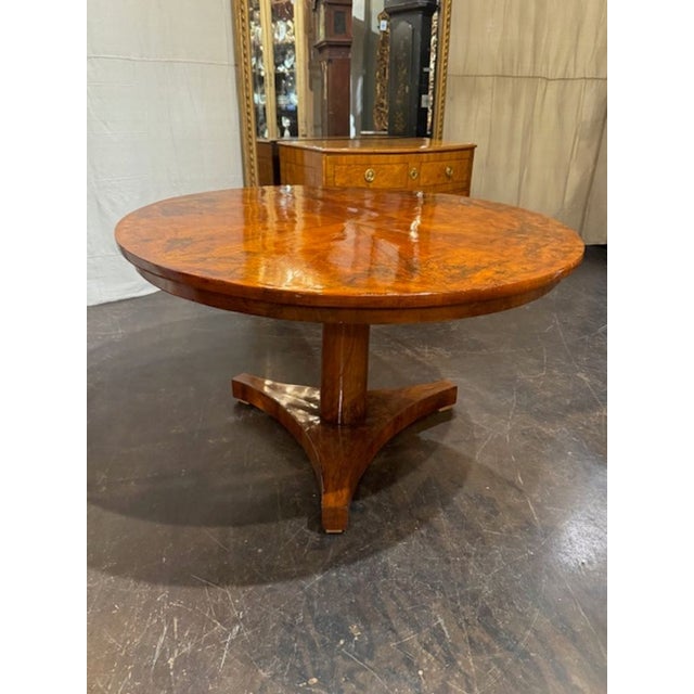 19th century German Biedermeier walnut center table. Biedermeier center tables are celebrated for their restrained...