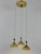 Rare, lovely and highly decorative mid-century modern perforated brass cascading pendant lamp or chandelier with three...