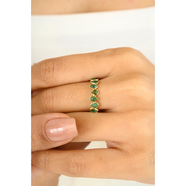 1.78 Carat Pear Cut Natural Emerald 18k Yellow Gold Full Eternity Band Ring symbolizes the everlasting love between a...