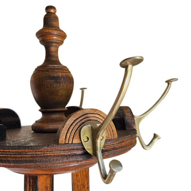 Distinguish your entryway with this exceptional late 19th to early 20th-century Arts & Crafts hall tree, a masterclass in...