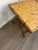 This is a vintage 1970s handcrafted bamboo serving folding table with a herringbone pattern top and X-base. The table...