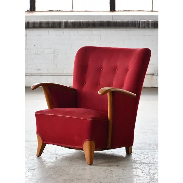 Elegant and unusual lounge chair from the 1940's in the style of Swedish Designer, Carl Malmsten. We have never seen any...