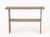American Brown Painted Two-Tier Console Table. 27" H x 40.5" W x 9.5" D. Provenance: From a 21 East 87th Street Estate.