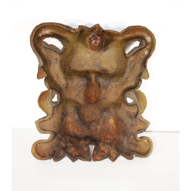 Vintage heavy cast iron mythical face wall hanging. Originally hung outside so developed nice patina. Weights over 6...