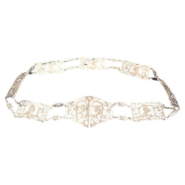 A rare and highly decorative Edwardian sterling silver belt and buckle by the celebrated London silversmith William...