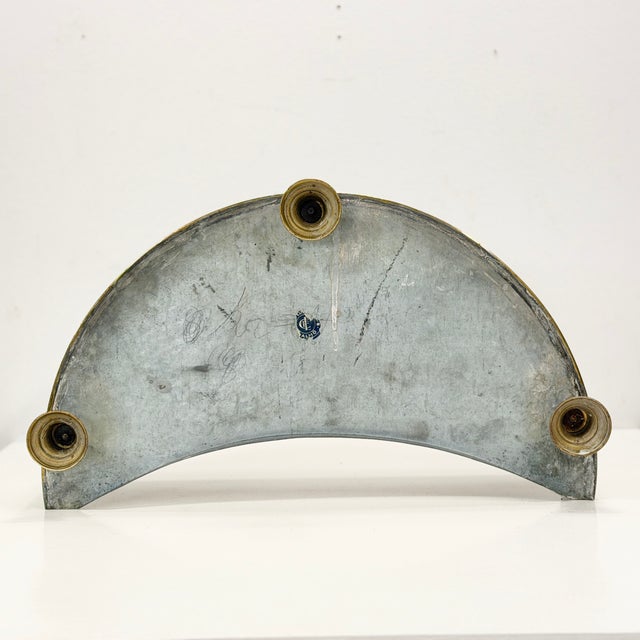 A beautifully crafted brass spark guard made by Carl Lunds F.A.B. in the early 20th century. It features an attractive...