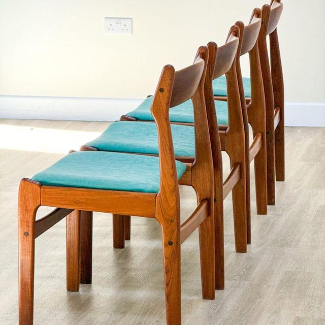 A beautiful set of four vintage dining chairs, handcrafted by Farstrup in Denmark during the 1960s. Each chair is expertly...