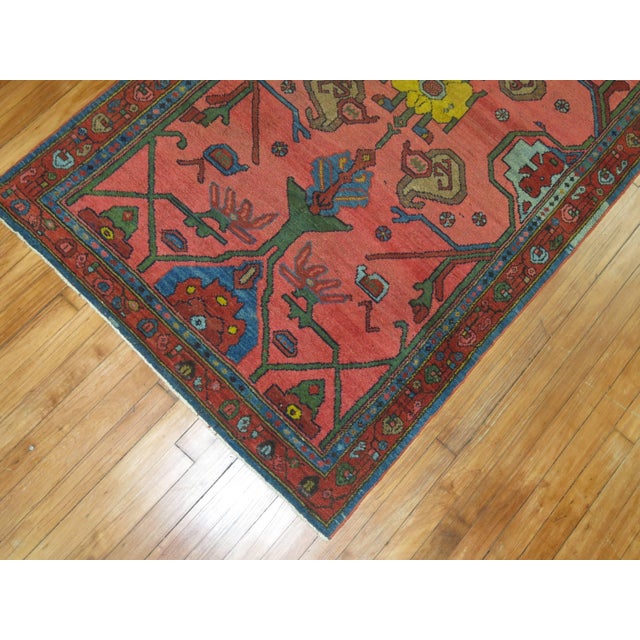 A colorful circa 1930 Persian rug from central Persia with blue, green, brown and yellow accents Measures: 3'6'' x 6'4''.