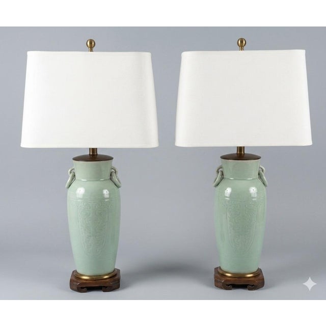 Vintage Frederick Cooper crackle glazed celadon porcelain table lamps. Produced around the 1970s to 1980s, these mid-...