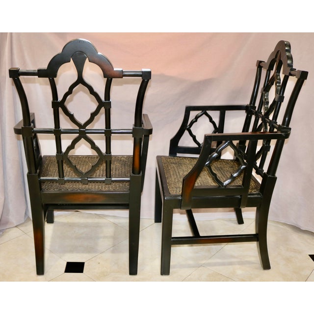 Vintage Jacobean Black Carved Wood Arm Chairs With Caned Seat - A Pair