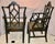 Vintage Jacobean Black Carved Wood Arm Chairs With Caned Seat - A Pair