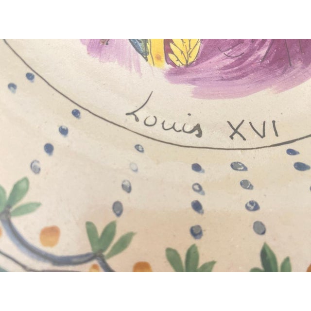 The plates are in faience. It has been made in France, during the 20th century. The pattern decor is French Revolutionary...