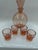 A beautiful, antique liqueur or spirits set made of delicate salmon-colored Rosalin glass. The set consists of an...