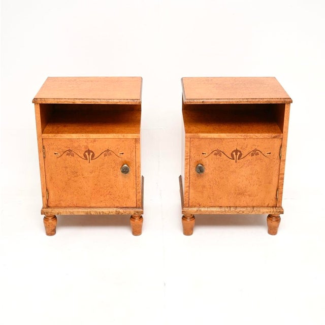An extremely beautiful pair of Swedish Art Deco bedside cabinets in satin birch. They were recently imported from Sweden,...