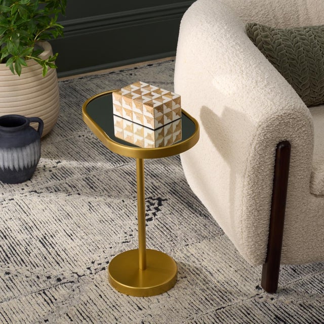 Elevate your living space with the ultra-chic IKAKY Side Table. Crafted with meticulous attention to detail, this piece...
