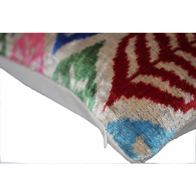 This stylish handmade velvet Ikat pillow cover can accent your sofa, chair, or bedding in a wide variety of interior...