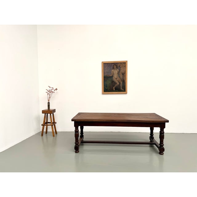 Maison lecan presents this solid walnut farmhouse table with turned legs, made in france in the 1950s. The walnut has...