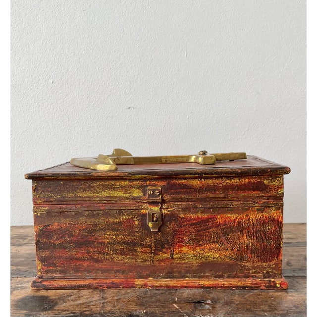 This vintage nautical keepsake box is a striking piece of maritime-inspired decor, perfect for adding a touch of seafaring...