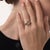 This beautiful vintage diamond trilogy ring is a timeless 1970’s design, centered by a GIA-certified old mine cut diamond...