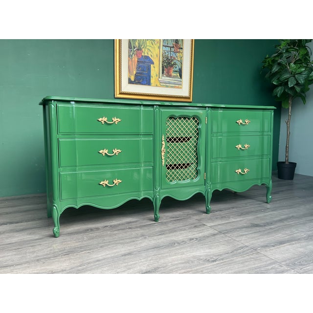 A 1970's Solid built provincial dresser on nine drawers with dovetail joints and metal hardware This dresser is newly...