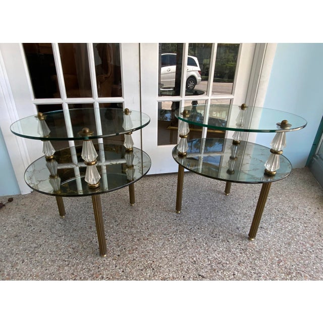 Beautiful Glass and Brass Side Tables in great condition. Great for any home to add that special touch. The tables are two...