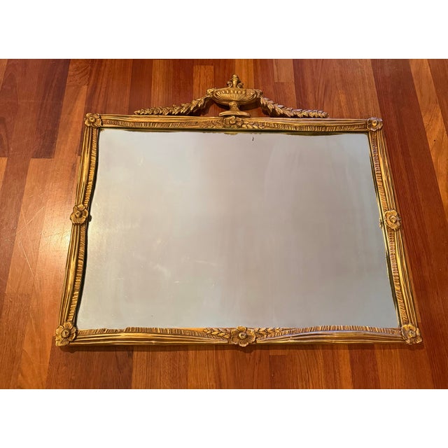 Early 20th century giltwood mirror in the Louis XVI / French Neoclassical Revival style, dating to the 1920s–1930s. The...