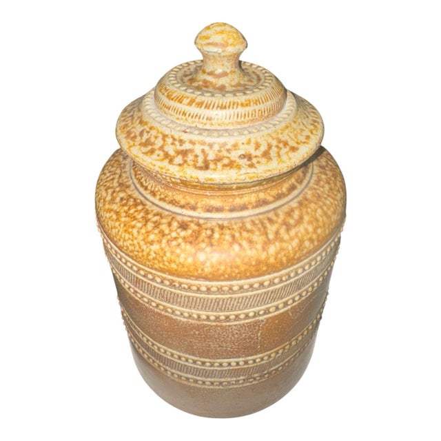 A heavy, hand-thrown stoneware kitchen canister made by the family-run Campos Filhos workshop in Aveiro, Portugal. Dating...