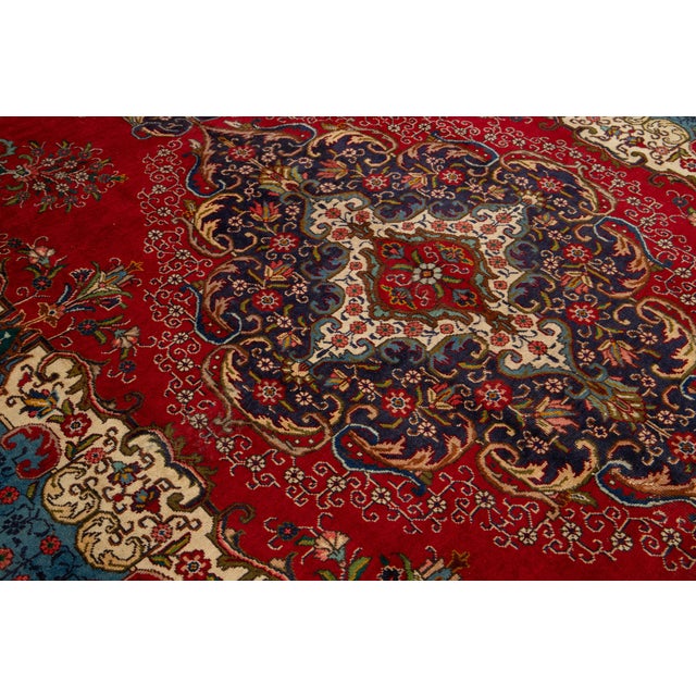 This Vintage Handmade Persian Tabriz Wool Rug in a Rich Red With a Rosette Motif For Sale - Image 10 of 10