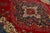 This Vintage Handmade Persian Tabriz Wool Rug in a Rich Red With a Rosette Motif For Sale - Image 10 of 10