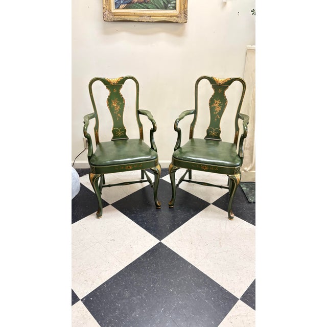 This is a stunning pair of mid-century Queen Anne style Chinoiserie lacquered armchairs, notable for their elegant...
