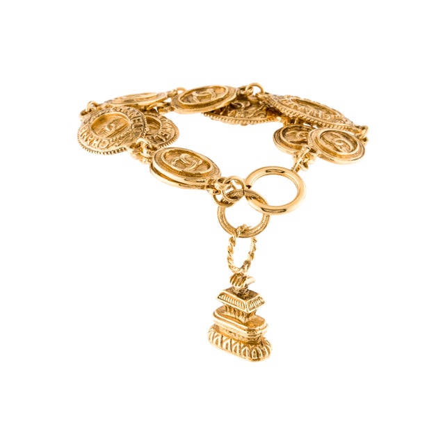 This vintage Chanel seal charm bracelet is from the mid-70s (circa 1971-1980). It belongs to a celebrated era of Chanel...