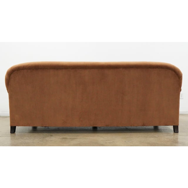 Vintage sofa by Lauren Furniture Company, upholstered in a warm camel/tan velvet or suede-like fabric. The sofa features a...