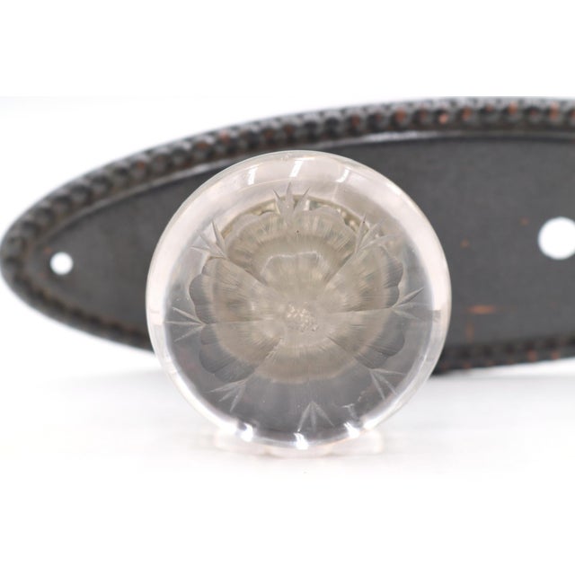 Antique round clear etched floral glass door knob with a japanned beaded steel back plate. The original mounting screws...