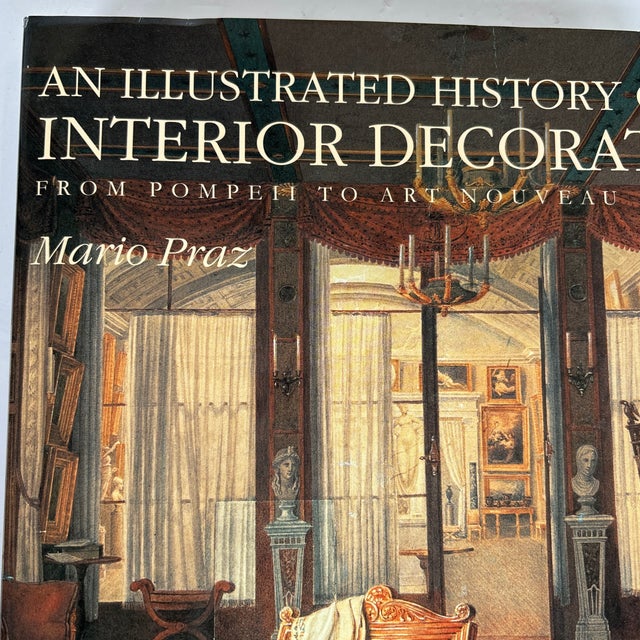Hardcover book entitled An Illustrated History of Interior Decoration by Mario Praz. A detailed accounting of interior...