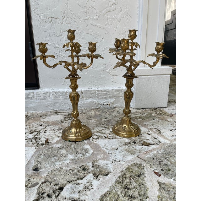 Pair of French Gilt Bronze Four-Light Candelabra – Napoleon III Period (c. 1850) Elegant pair of French gilt bronze four-...
