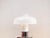 The Brumbury table lamp is an example of Italian Space Age design, designed by Luigi Massoni for lighting manufacturer...
