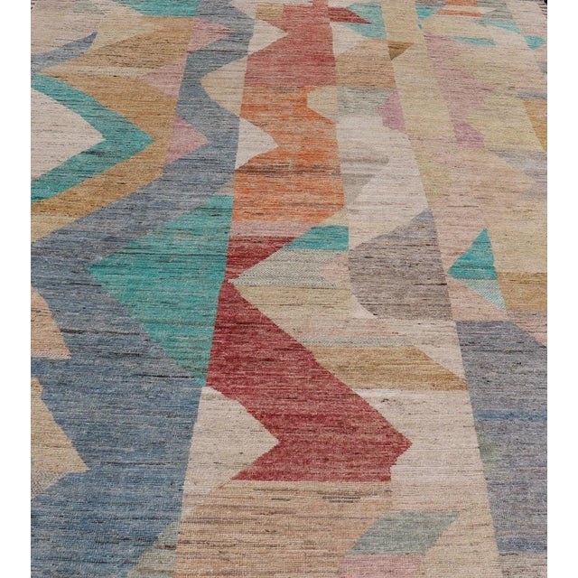 Hand-Knotted Modern Casual Rug by Keivan Woven Arts 10'5 x 13'10 Measures: 10'5 x 13'10. This modern casual rug has been...