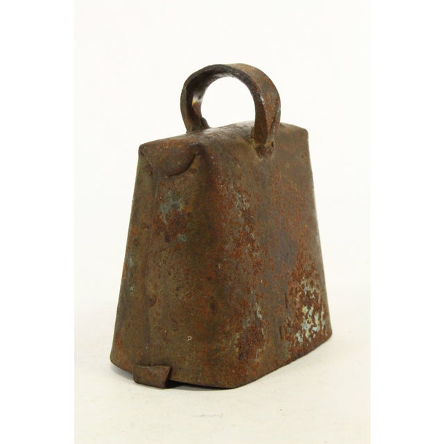 An early cow bell Blacksmith crafted from wrought iron sheet, thick and sturdy, with flattened shape Original iron clapper...