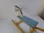 This mid-century wooden rocking horse, crafted in 1960s Czechoslovakia, displays the playful yet artisanal qualities...