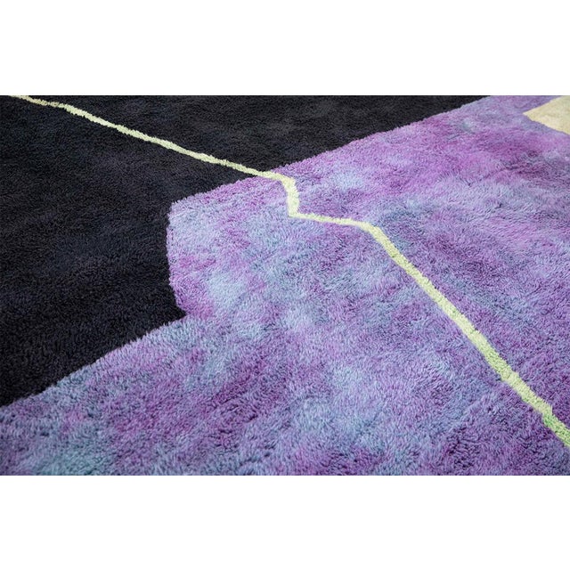 Bold, dramatic, and utterly unforgettable. This large-format hand-knotted Moroccan rug is a masterwork of color and...