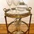 A beautiful, attractive, and imposing Art Deco brass serving trolley from the 1950s that evokes a strong sense of...